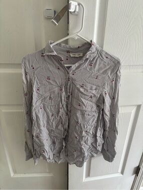 beachlunchlounge White and Black Striped Button-Up Blouse with Red Accent Print